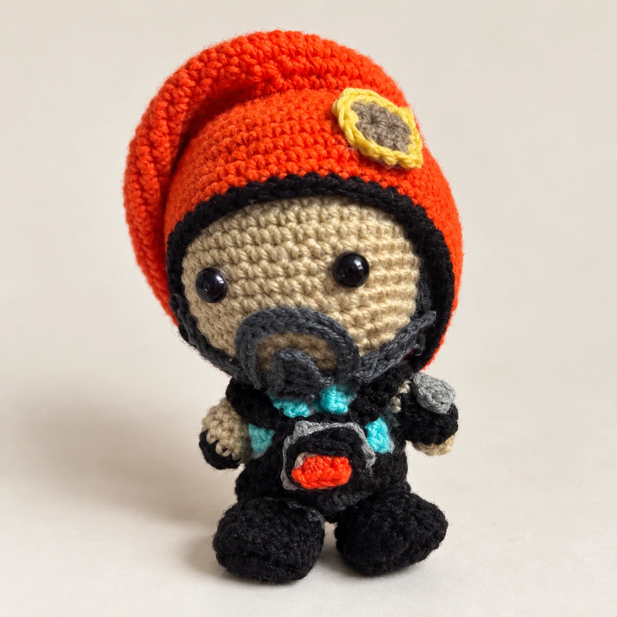 Brimstone crochet doll wearing an orange beret and dark tactical outfit