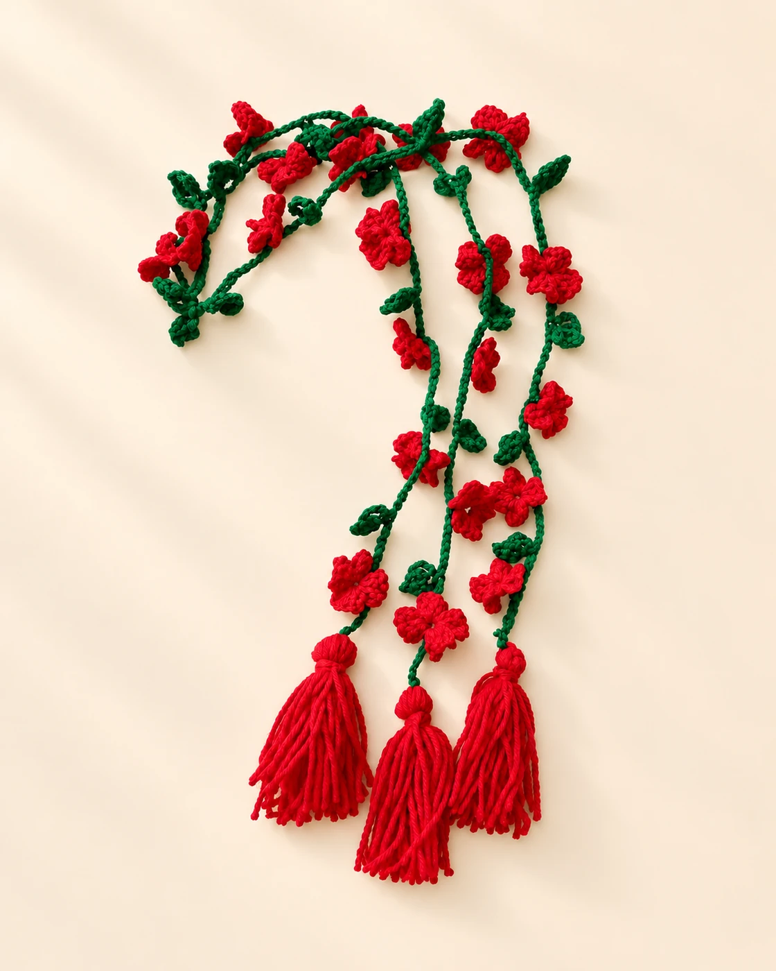 Red lacha dori with flowers attached.
